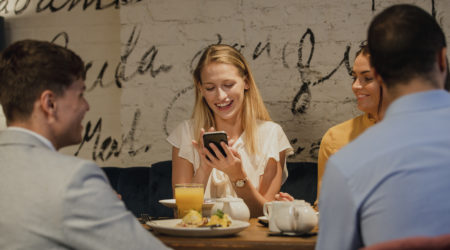 Using Smartphone In A Restaurant