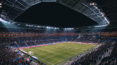A large stadium lit up at night.